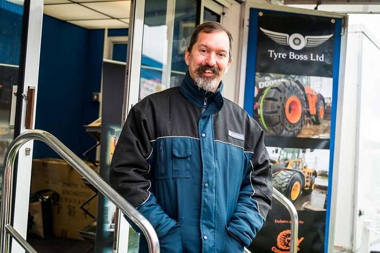 Wayne Collins on Tyre Boss show stand Wayne Collins on Tyre Boss show stand